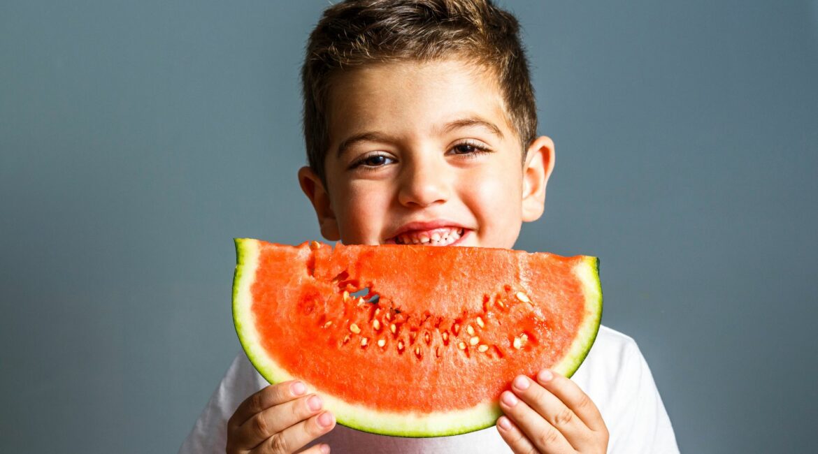 kid eating fruit, kid eating watermelon, happy kid