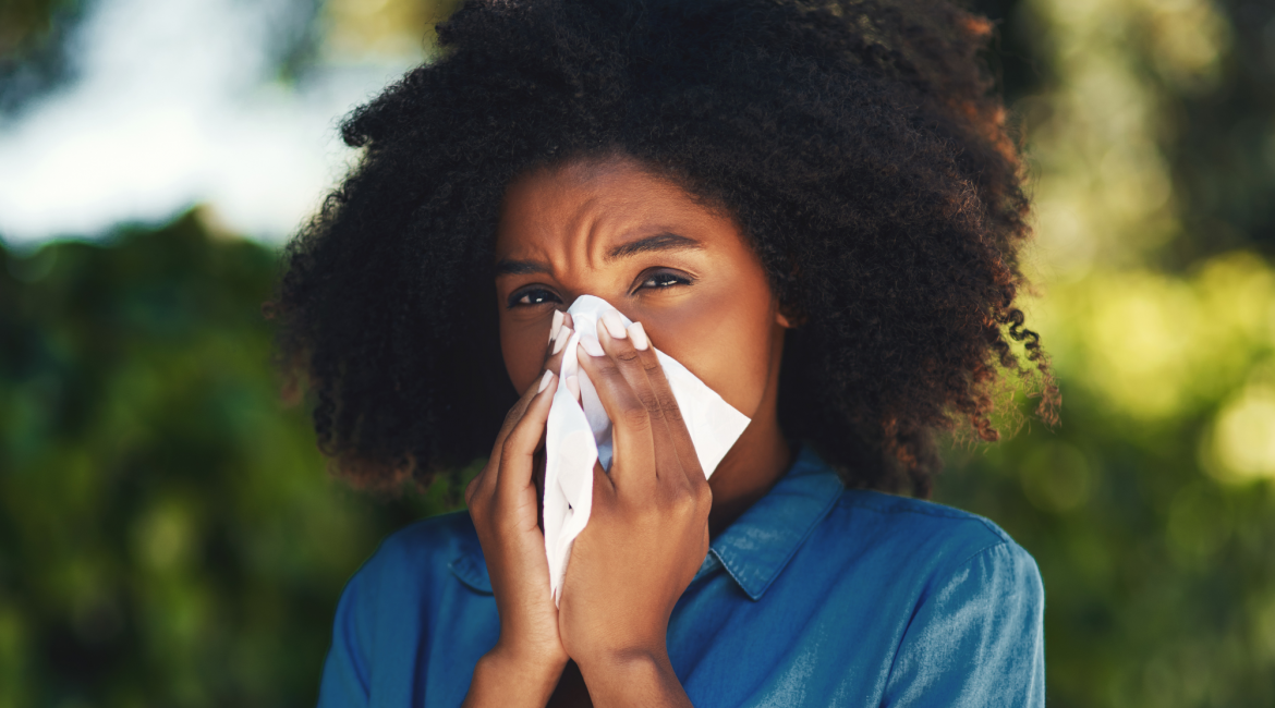 Women sneezing, woman blowing nose, tissue